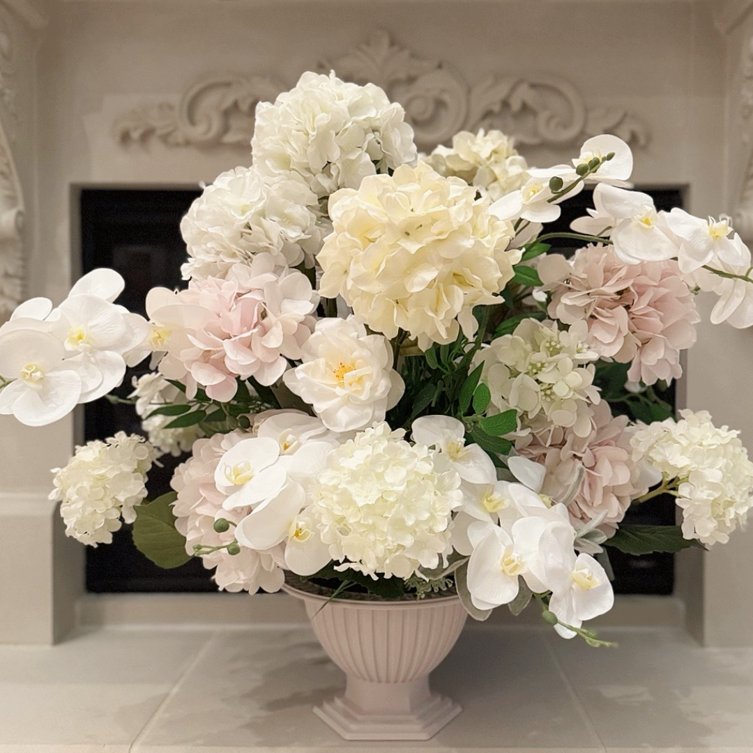 Luxury permanent floral arrangement in Grand Palais vessel featuring hydrangeas, orchids, roses, and lifelike blooms