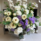 Lavender Haze floral arrangement in the Queen Palais Bowl, featuring premium lifelike lavender, ivory, cream, and white blooms with eucalyptus in the Bone White finish.