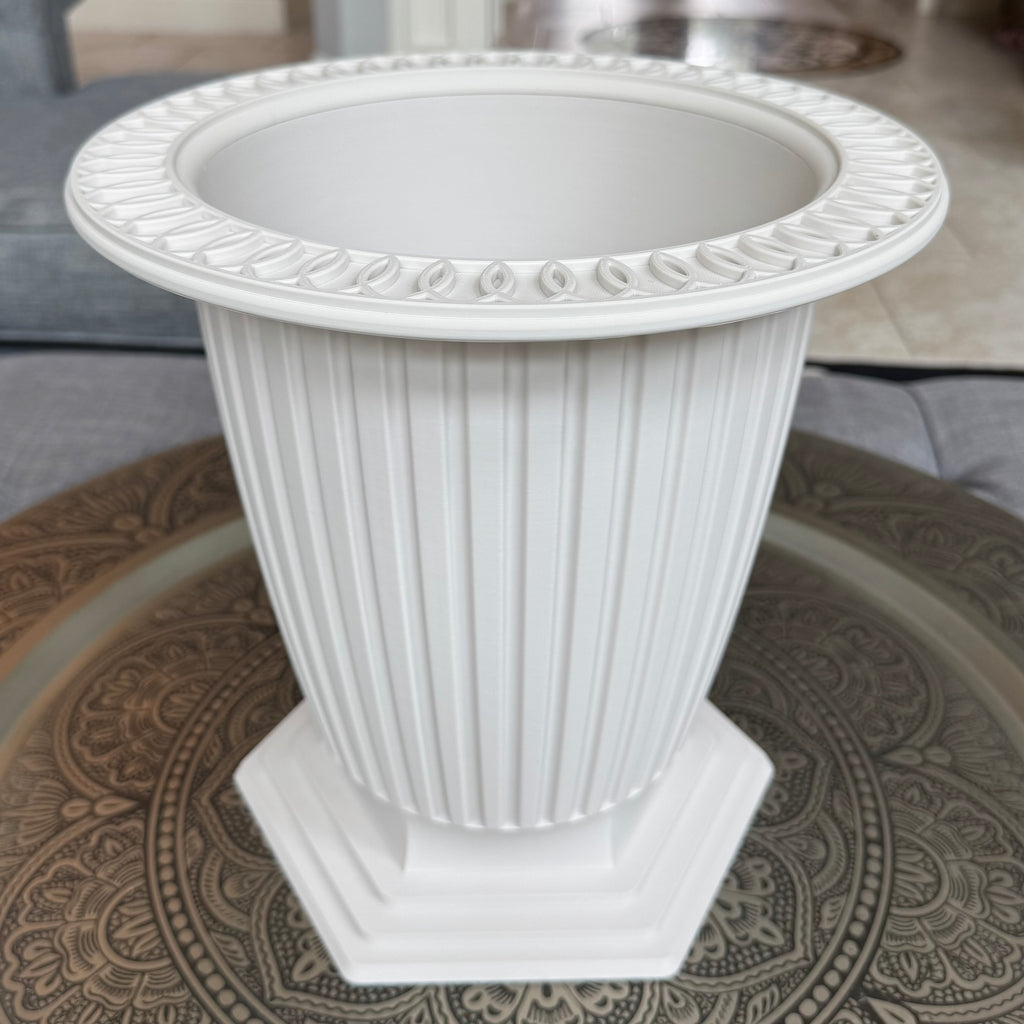 Grand Palais fluted pedestal vessel in Bone White with decorative rim, approximately 12 inches high and 12 inches in diameter.