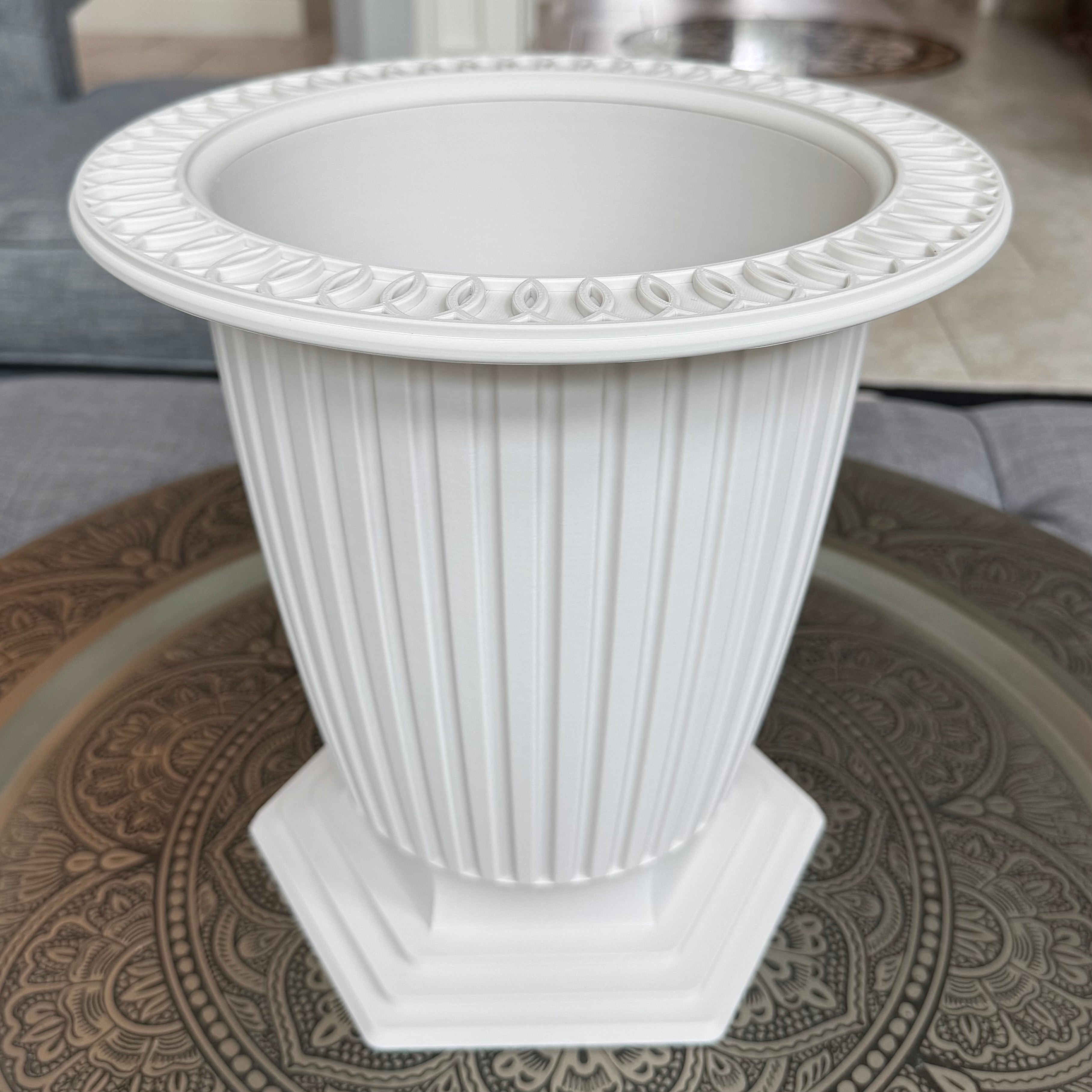 Grand Palais fluted pedestal vessel in Bone White with decorative rim, approximately 12 inches high and 12 inches in diameter.