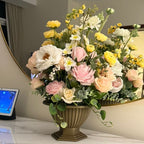 Warm Bronze Palais Bowl permanent floral arrangement in Pink Lemonade palette displayed on a tabletop