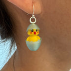 Chickadee Hatching Chick earring worn by model