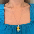 Chickadee Hatching Chick necklace worn as a whimsical everyday accessory
