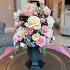 Column Vase floral arrangement in the Onyx Shimmer finish, Duchess size, Rosé Champagne palette, featuring lifelike blush pink and ivory roses, pink carnations, ranunculus, eucalyptus, and trailing greenery.