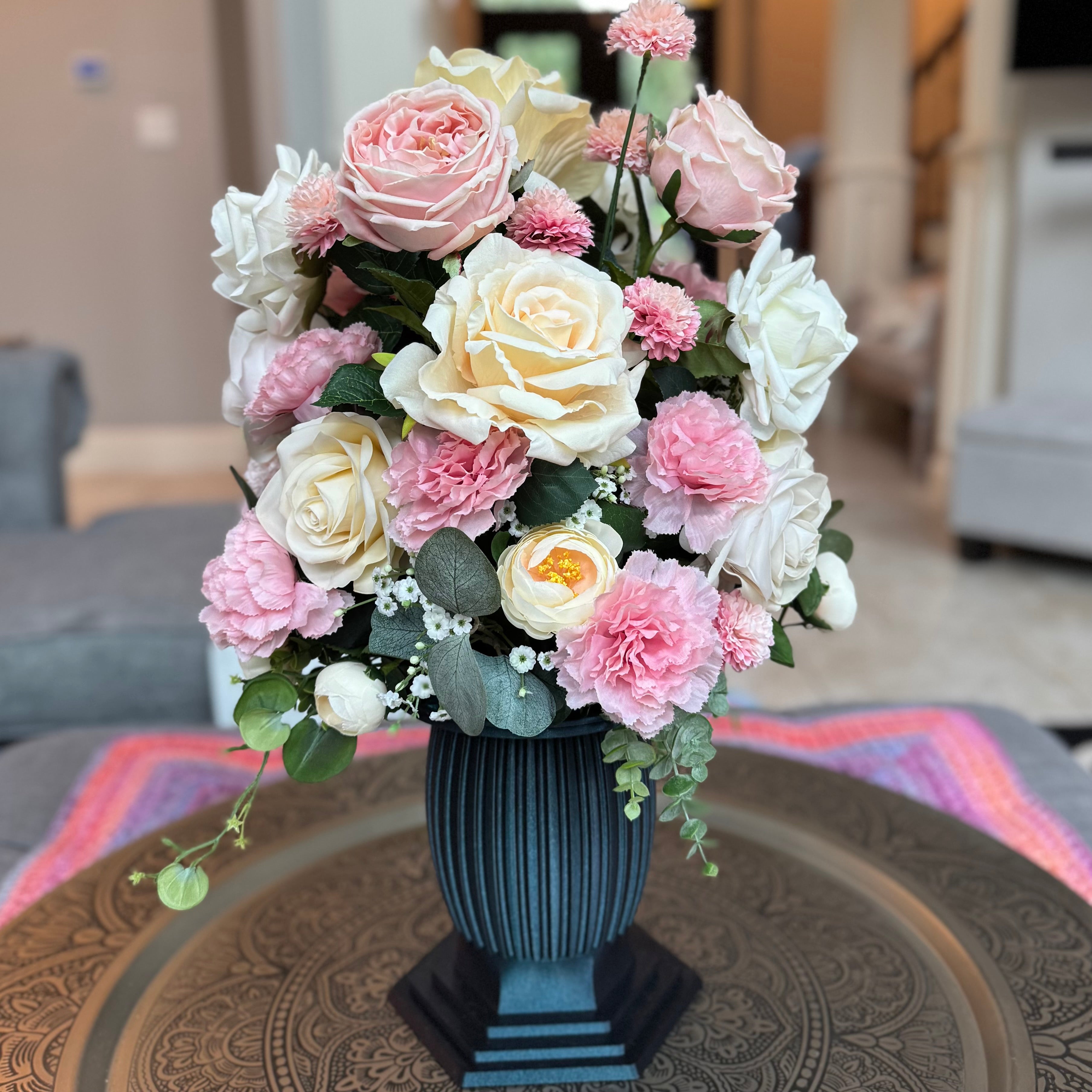 Column Vase floral arrangement in the Onyx Shimmer finish, Duchess size, Rosé Champagne palette, featuring lifelike blush pink and ivory roses, pink carnations, ranunculus, eucalyptus, and trailing greenery.