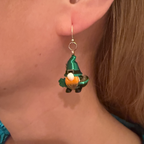 St. Patrick's Day Lepre-Gnome Earrings worn on ear