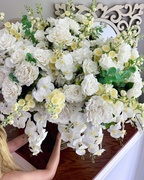 Grand Palais Platinum floral arrangement in the Warm Bronze finish, Crème Chantilly palette, featuring lifelike white roses, peonies, orchids, hydrangeas, snapdragons, and eucalyptus.