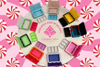 D&W Delightful Wares magnetic pill box collection featuring removable 3-compartment organizer inserts, secure magnetic closures, and colorful designer cases.