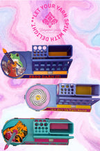 Premium yarn spinner organizer collection featuring Frog Darn It! frog, Yarn Spin Me Right Round sheep, and Don't Thread On Me cat designs with built-in yarn spinner, phone and tablet stand, crochet hook and knitting needle storage, removable tray compartment, and detachable carry handle.