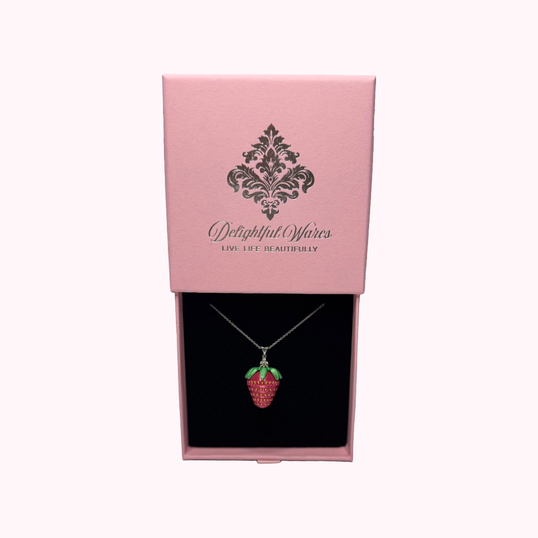 Strawberry pendant necklace presented in a pink D&W Delightful Wares gift box.